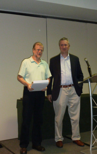 vernon-_henderson Vernon Henderson (left) receiving a plaque from Gilles Duranton